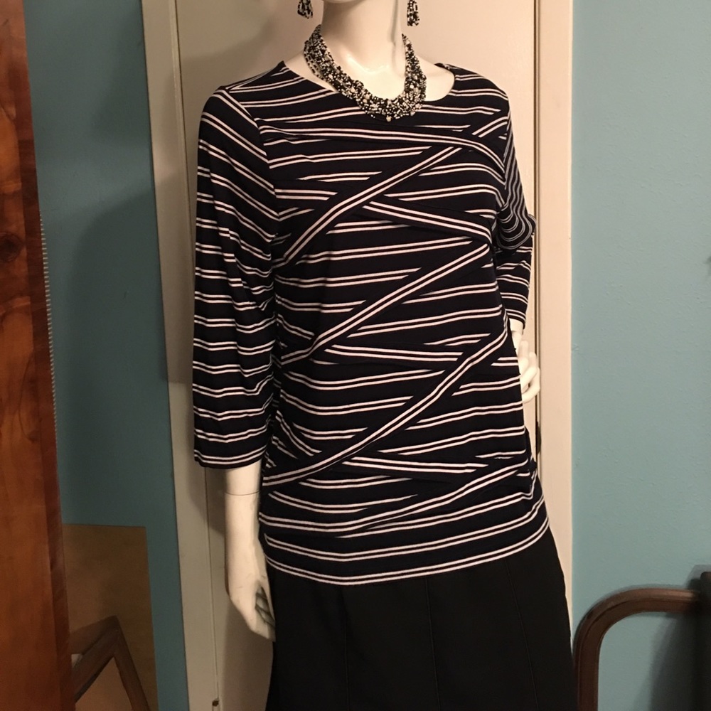 Navy and white Chico’s top. Size 2